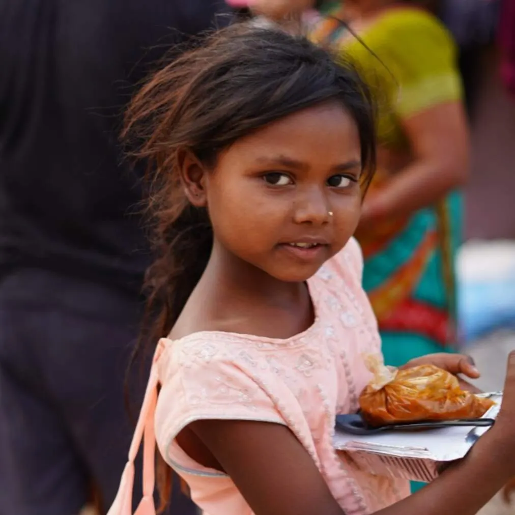 A smile, a meal, and the promise of a brighter tomorrow.